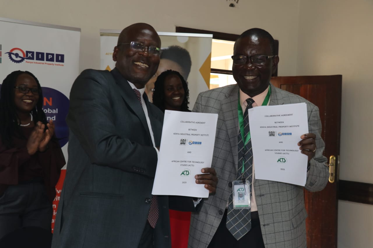 Photo Caption:  John Onyango (Left), Institute's MD, & Prof. Tom Ogada (Right), ACTS Executive Director, exchange documents after signing the MoU to set up a TISC