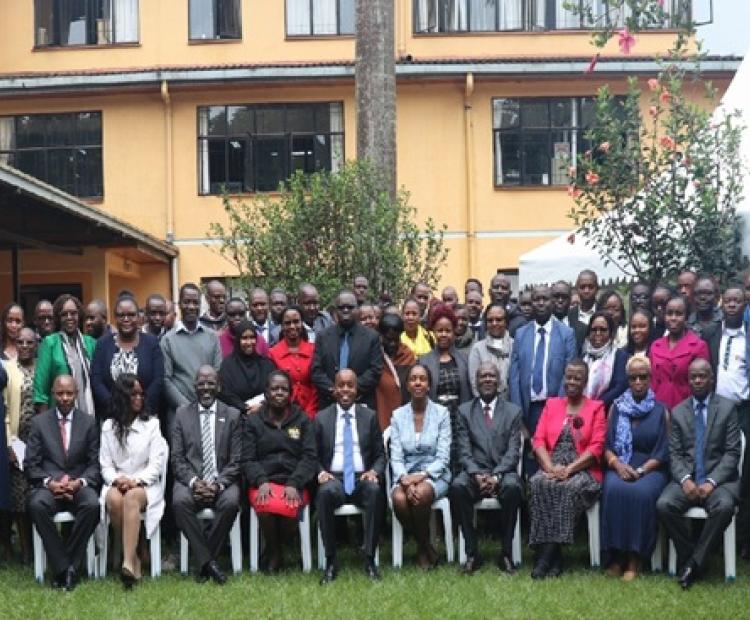 Allan Kosgey (Seated 5th from Left), KIPI Board Chairman, in group photo with fellow Board Members and staff after the meeting